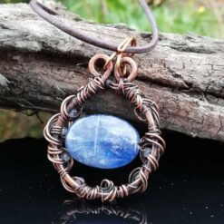 blue kyanite stone in copper wire jewellery pendant