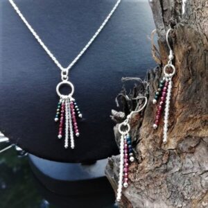 necklace and earring set in Sterling Silver, made with topaz garnet and spinel in an art deco style