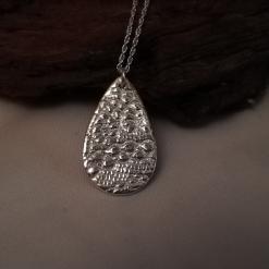 Fine silver large oval teardrop necklace. Lace texture