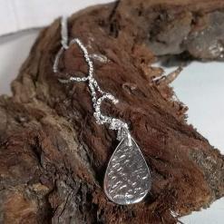 999 fine silver handmade oval teardrop pendant necklace. Textured pattern pendant.