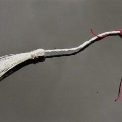 mini wire broomstick with red cord on the handle