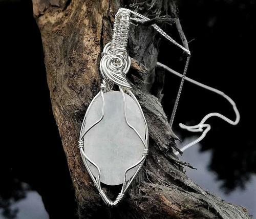 back of white moonstone sterling silver wire wrapped pendant necklace
