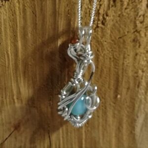 wire wrapped Sterling Silver larimar pendant necklace with orange agate stones