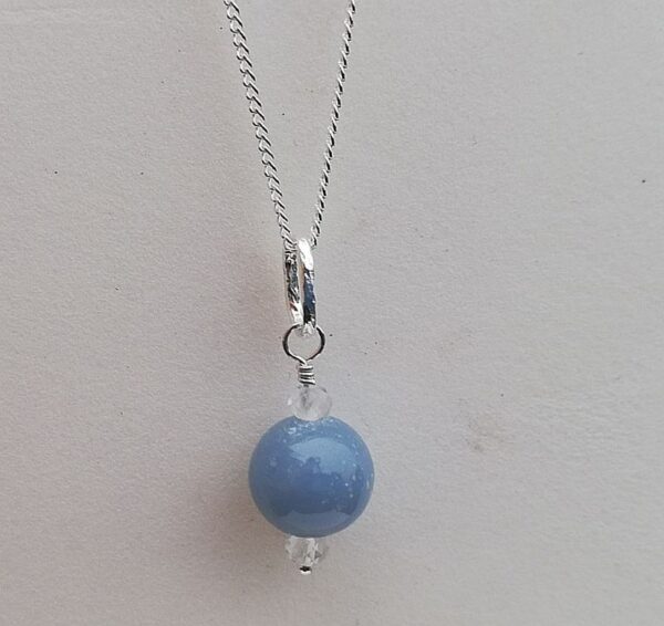 blue stone with tiny clear stones on sterling silver. necklace