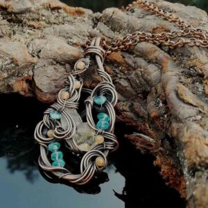 citrine, neon blue apatite and orange agate woven in copper wire. Pendant necklace