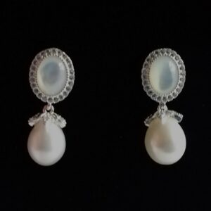 white pearl drops from white mother of pearl oval and white topaz. Fancy earrings