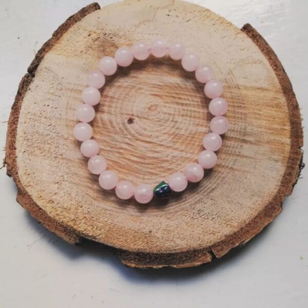 rose quartz bracelet with laughing buddha bead